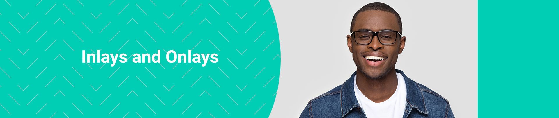Smiling man in glasses and a denim jacket